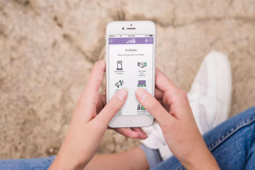 A graphic of the Mind Of My Own One app on a mobile phone.